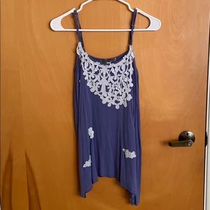 Purple camisole with white flowers